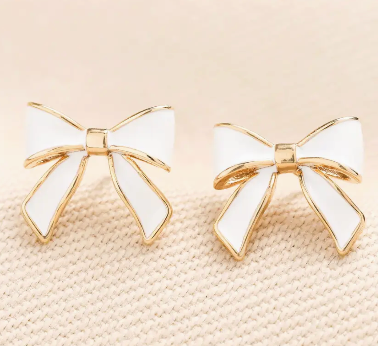 gold white bow studs