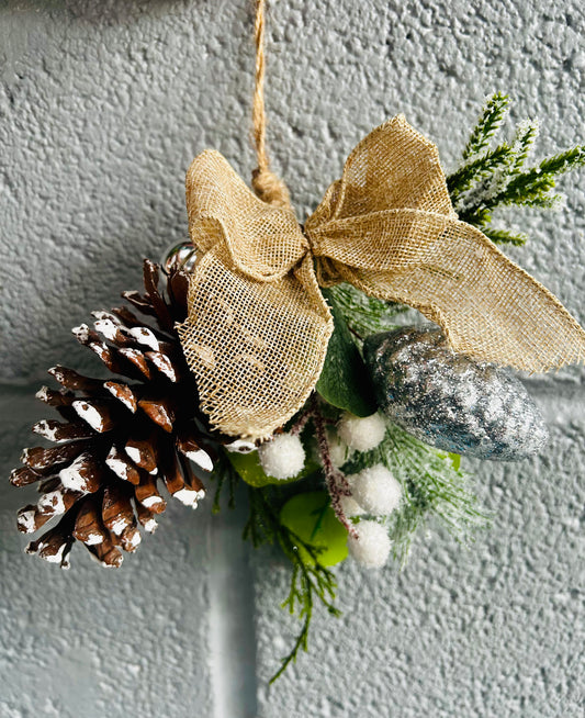 Pine cone metal bell and bow hanger