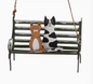 Cats on park bench