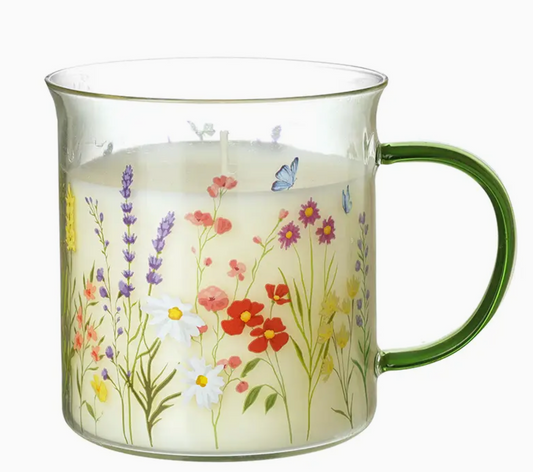 scented candle in floral glass mug