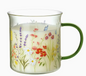 scented candle in floral glass mug